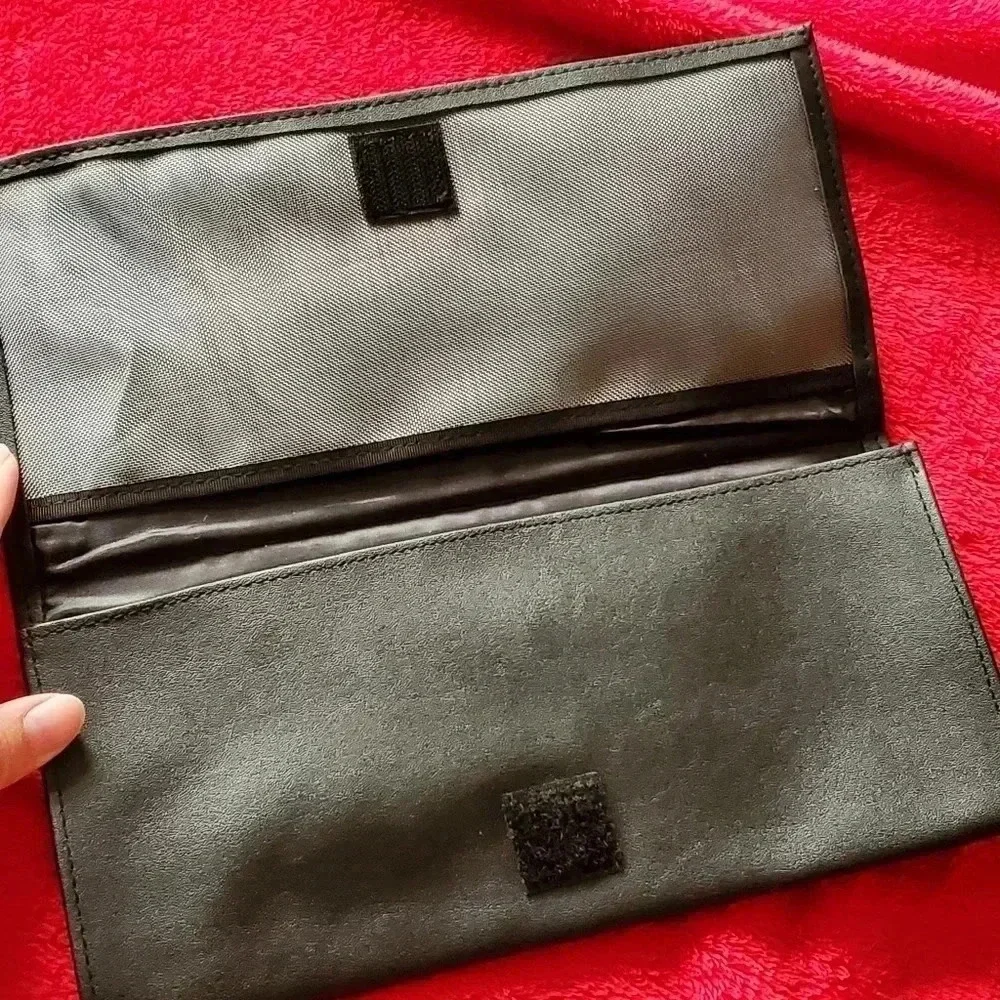 Travel clutch​​​